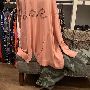 - LLOVE this very cute sweater it has LOVE i